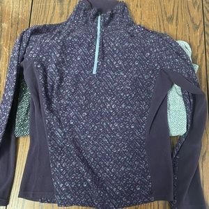 Three Women’s Columbia fleece sweaters